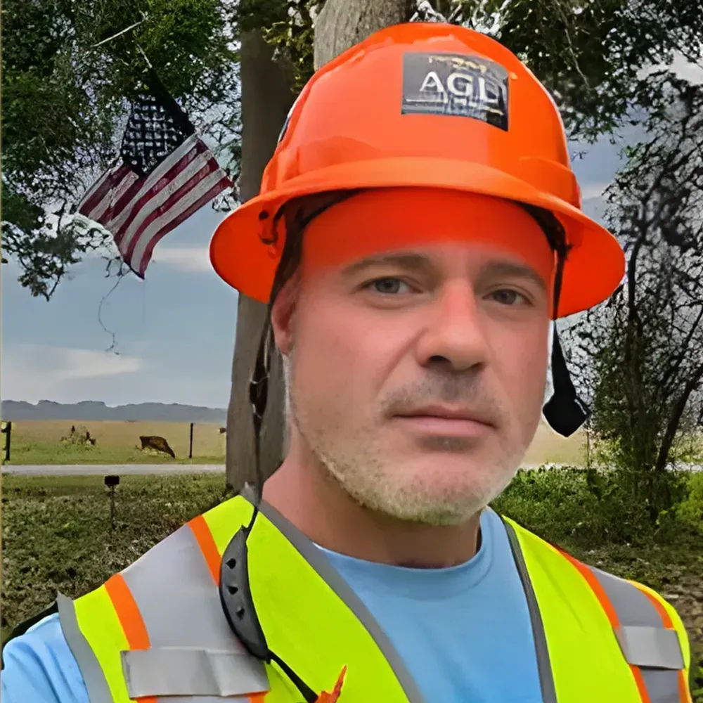 Portrait of Dominick Schilleci, founder of AGL Drone Imagery, in safety gear